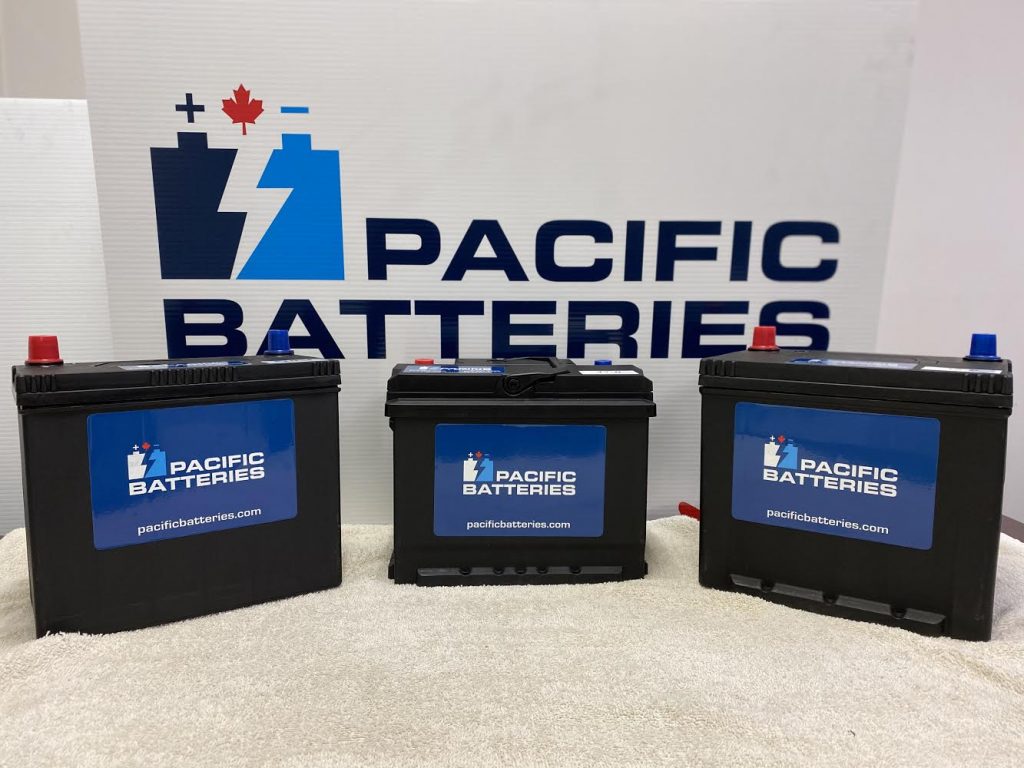 3 car batteries on display